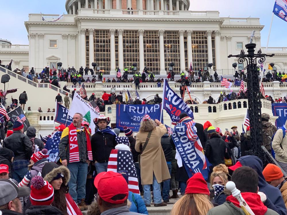 Moment image for Supporters of Trump stormed Capitol in protest against election results.