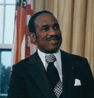 Moment image for Grenada gains full independence, Eric Gairy becomes Prime Minister, economy reliant on nutmeg exports.