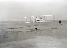 Wright brothers achieve powered flight milestone in Kitty Hawk, North Carolina.