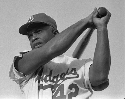Moment image for Jackie Robinson makes history as the first African American in Major League Baseball, breaking barriers.