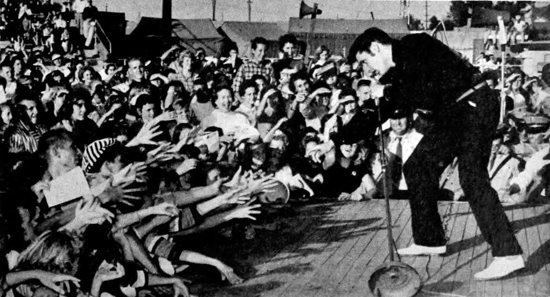Moment image for Elvis Presley becomes a national sensation with his hit songs and television appearances