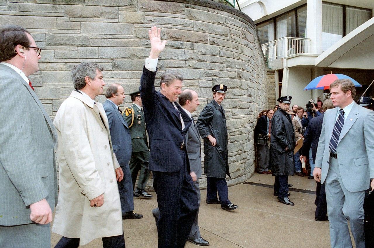 Moment image for Ronald Reagan survives an assassination attempt by John Hinckley Jr.
