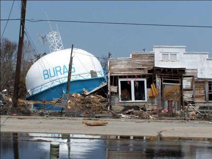 Moment image for Hurricane Katrina causes widespread destruction and loss of life in New Orleans and Gulf Coast.