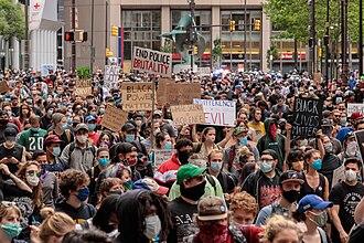 Moment image for George Floyd's killing ignites protests against police brutality and racial injustice across the country.