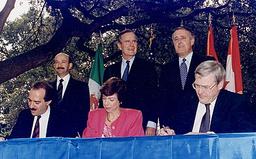 Canada joins NAFTA as a member, enhancing economic partnerships in North America.