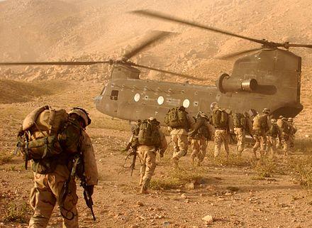 Moment image for Canadian troops in international intervention in Afghanistan post-9/11 attacks.
