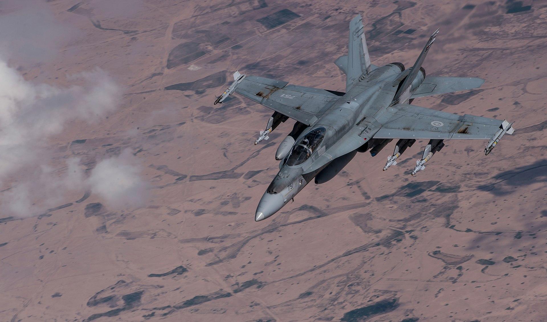 Moment image for Canada launches airstrikes against ISIS in Iraq and Syria in ongoing military operations.