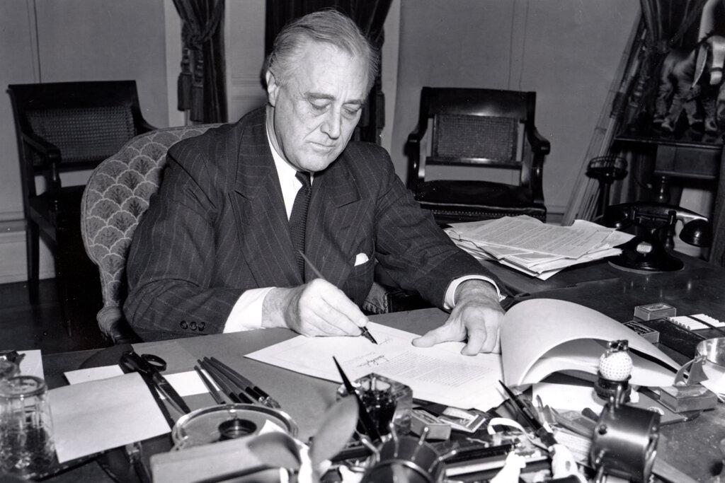 Moment image for Roosevelt Signs Lend Lease Act into Law