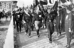 Mussolini's rise to power through March on Rome to establish fascist regime.