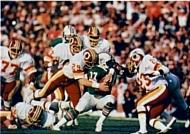 Moment image for Super Bowl XVII: Washington Redskins defeated Miami Dolphins 27–17 at Rose Bowl in Pasadena, California.