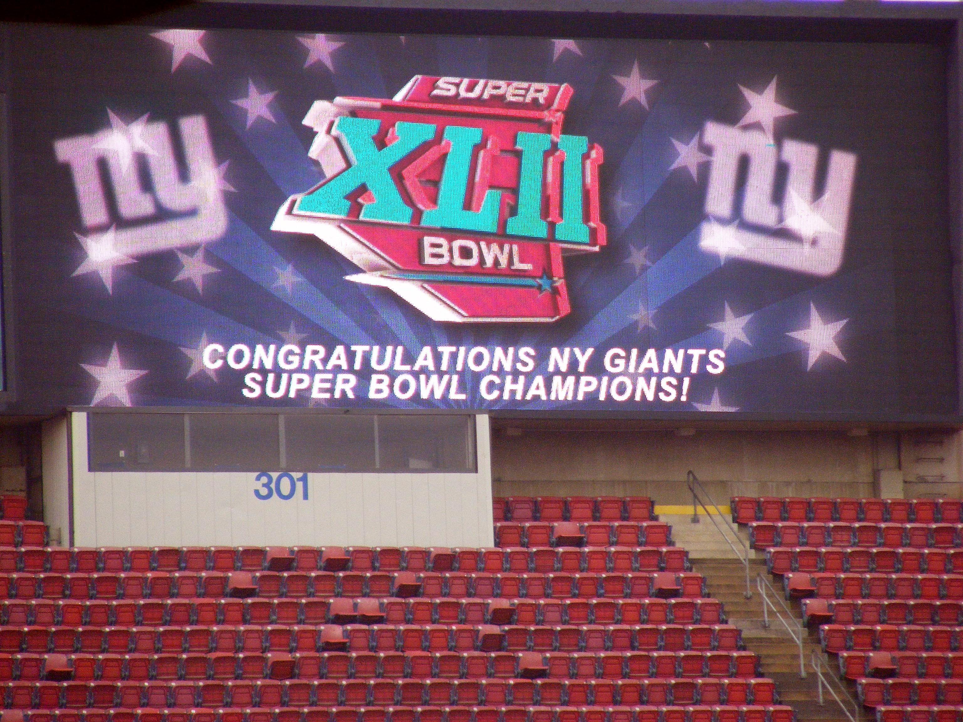 Moment image for Super Bowl XLII: New York Giants defeated New England Patriots 17–14 at University of Phoenix Stadium in Glendale, Arizona.