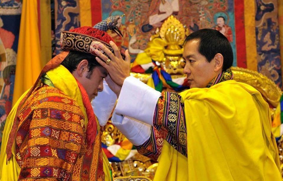 Moment image for King Jigme Singye Wangchuck passes kingship to son, King Jigme Khesar Namgyel Wangchuck.