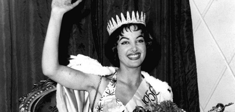 Moment image for Petra Schürmann: Germany's Miss World Winner in London, Signifying National Achievement.