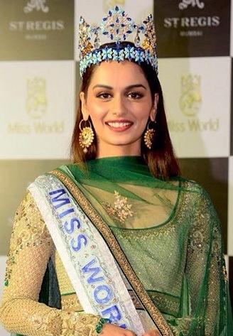 Moment image for Manushi Chhillar wins 67th Miss World; promotes menstrual hygiene and Indian representation globally.