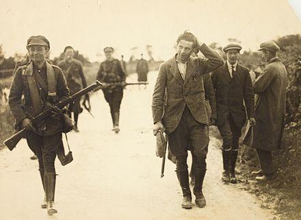 Moment image for Free State troops emerge victorious against anti-treaty forces in Irish Civil War conflict.