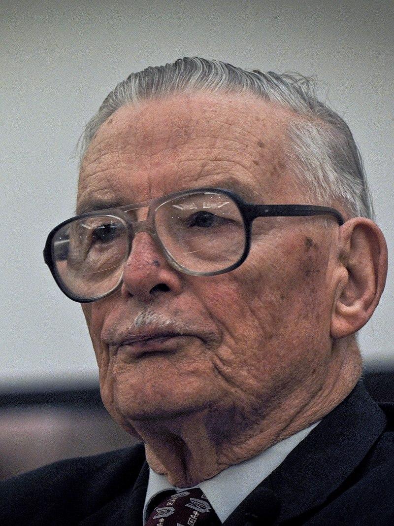 Moment image for James Buchanan Jr. Nobel Prize-winning work on economics, politics, public choice theory, and governance.