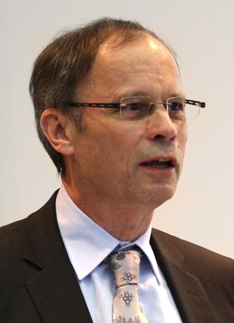 Moment image for Jean Tirole: Nobel Laureate in Economics for work on market power regulation, policy implications.