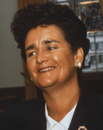 Moment image for The "Mother of All Budgets" is presented by Finance Minister Ruth Richardson.