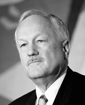 Moment image for Finance Minister Roger Douglas begins deregulating the economy.