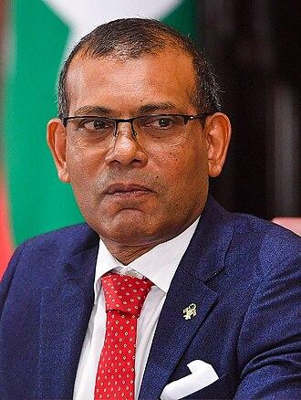 Moment image for Former Maldives President Mohamed Nasheed arrested, sparking political unrest and criticism of judicial process.