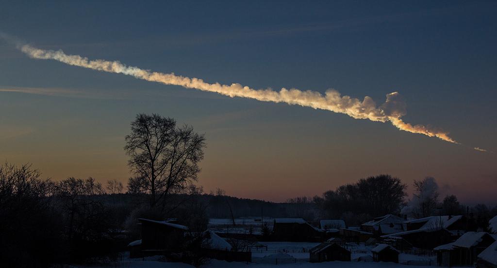 Moment image for Meteor explosion injures over 1,200 in Chelyabinsk, with immense energy.