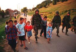 Resolution in Balkans: Yugoslav forces withdraw from Kosovo, NATO campaign ends, peacekeeping forces deployed.