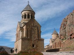 Construction of iconic Noravank Monastery showcases stunning medieval Armenian architecture and craftsmanship.