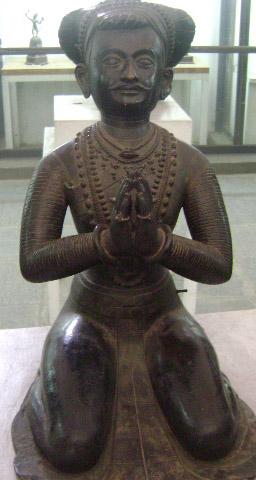 Moment image for Amshuverma, who started as a feudal lord and now the prime minister, starts minting coins in his name and assumes the title of Maharajadhiraj reducing the king to a mere figurehead