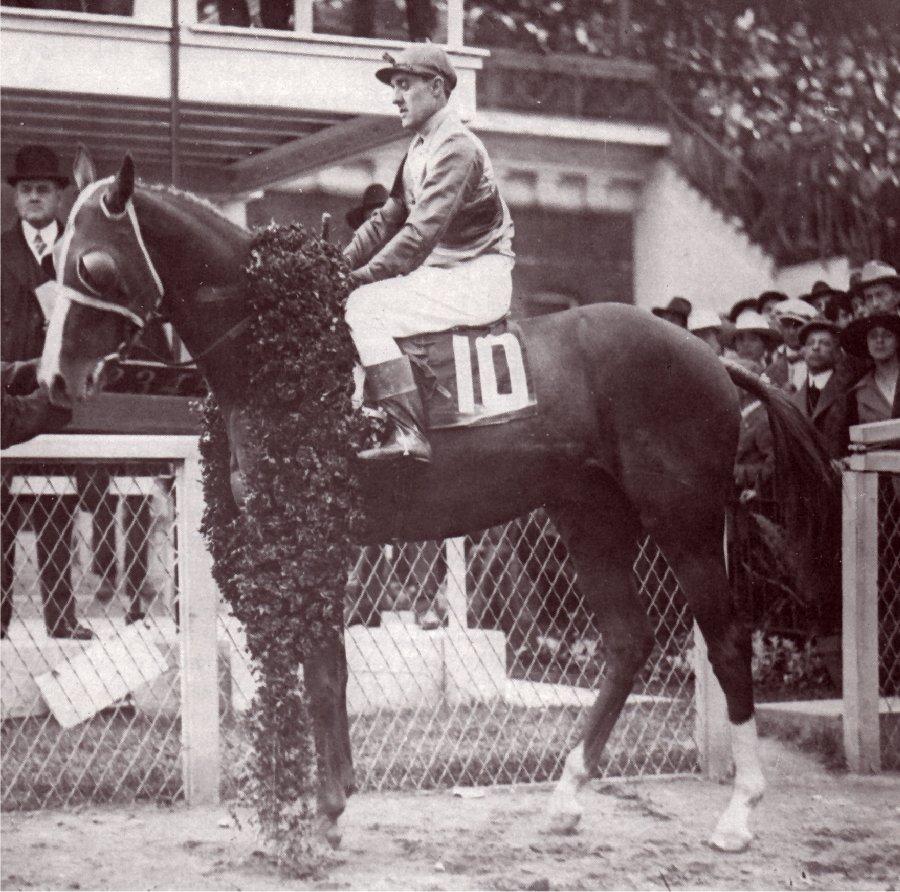 Moment image for Omar Khayyam wins with Charles Borel riding in 2:04.6 on a fast track.