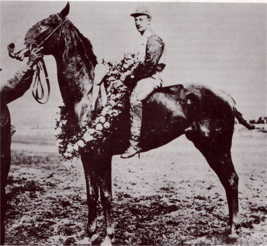 Moment image for Pink Star Wins: Jockey Andy Minder, Trainer William H. Fizer, Owner J. Hal Woodford, Heavy Track.