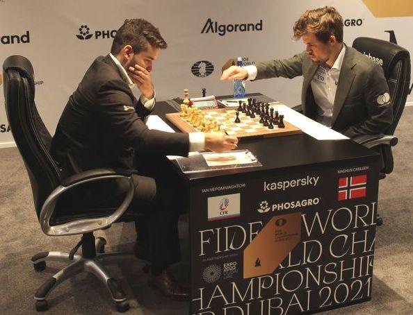 Moment image for Magnus Carlsen Retains World Chess Title in 2021