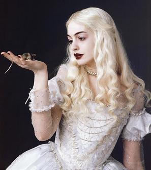 Moment image for "Alice Through the Looking Glass" explores Wonderland with Anne Hathaway as the White Queen.