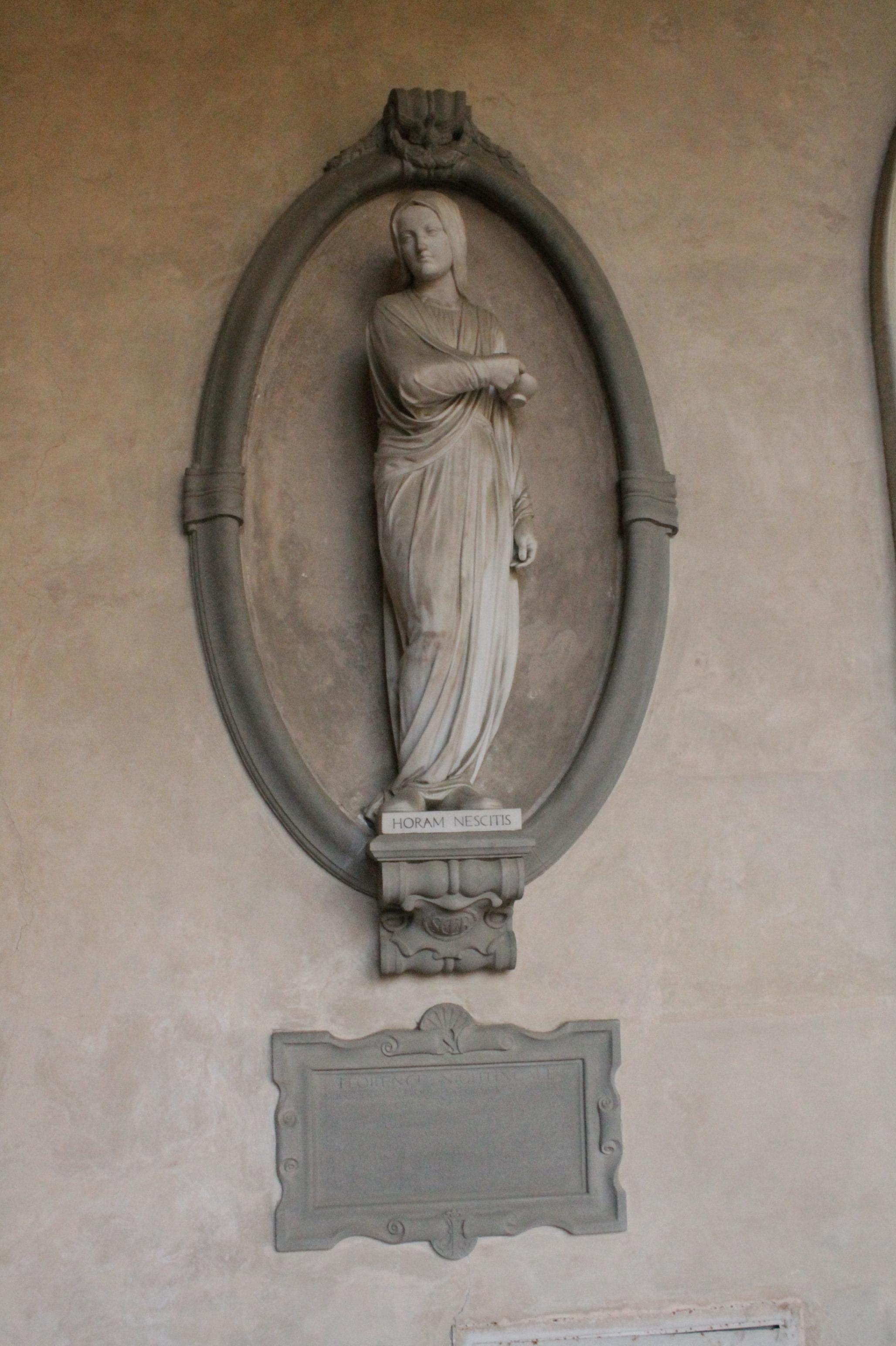 Moment image for Memorial monument in Carrara marble at Basilica of Santa Croce in Florence, Italy.