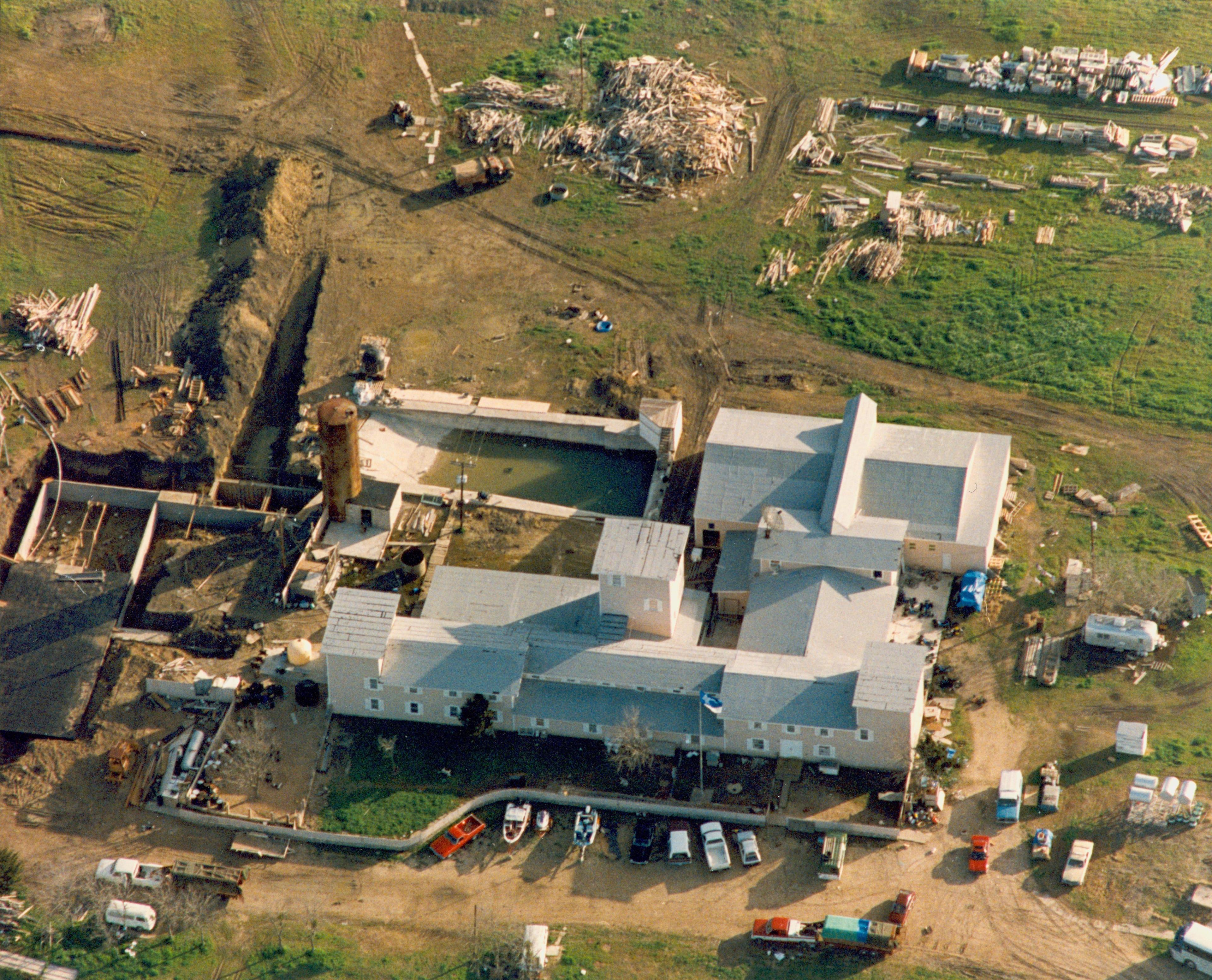 Moment image for Tragedy in Waco: Standoff with Branch Davidians ends in 82 deaths.