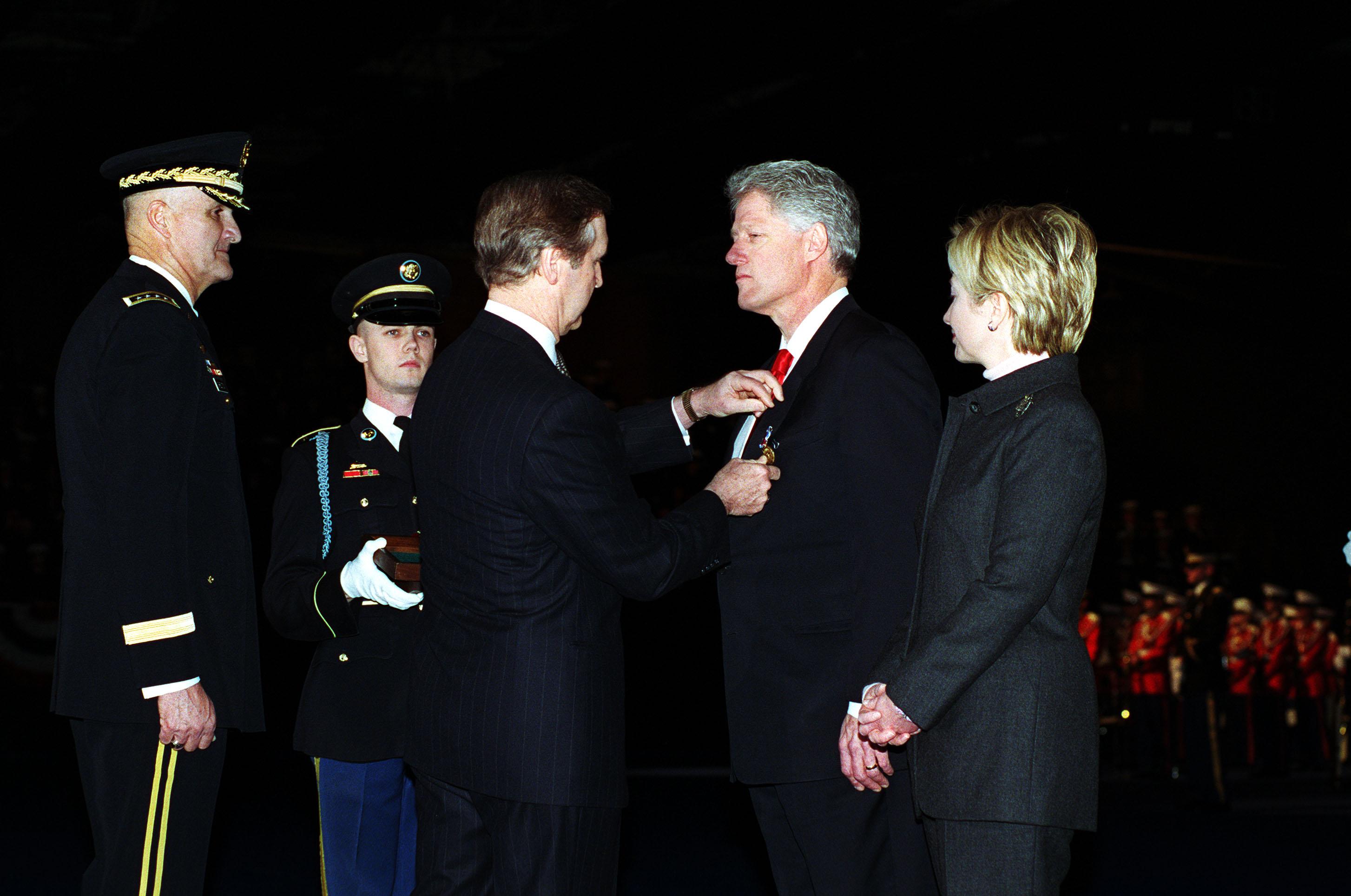 Moment image for Medal for Distinguished Public Service presented by Secretary of Defense.
