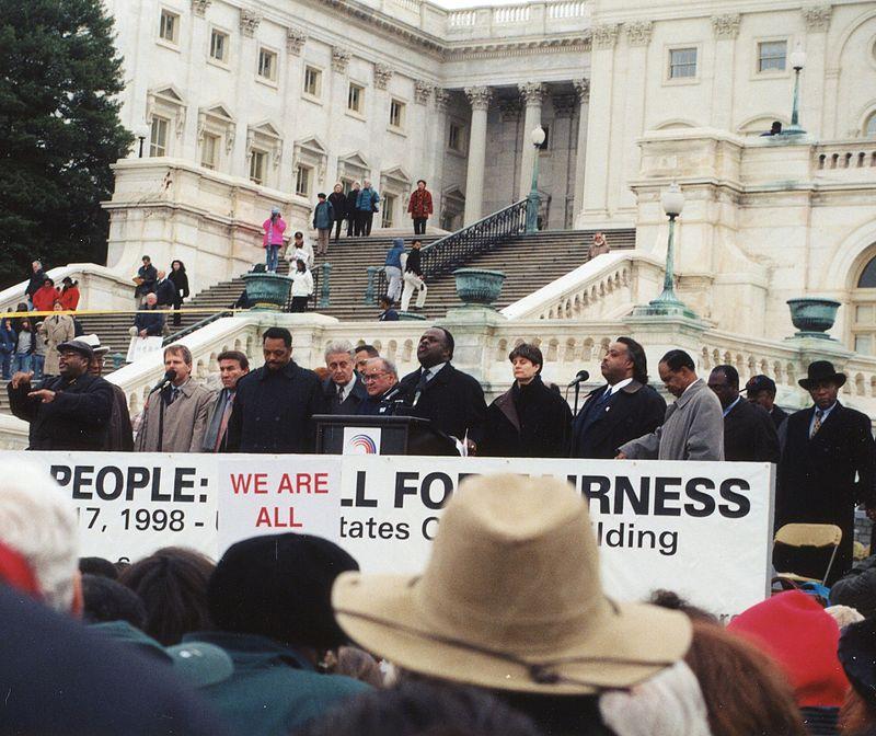 Moment image for House Votes for Impeachment on Four Articles of Perjury and Obstruction.
