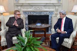 Discussed AIDS Relief with John Kerry