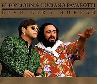 Moment image for John's duet with Luciano Pavarotti