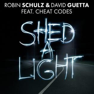 Moment image for David Guetta, Robin Schulz, and Cheat Codes collaborate on hit single "Shed a Light."