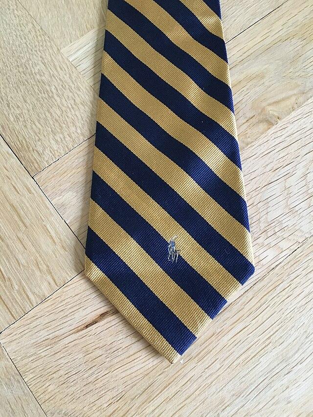 Moment image for Ralph Lauren's iconic ties launch his fashion empire with exceptional quality and distinctive designs.