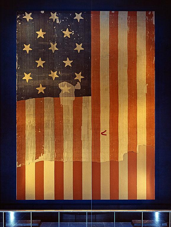 Moment image for Unveiling of Preserved Star-Spangled Banner at Smithsonian: Cultural preservation milestone with private support.
