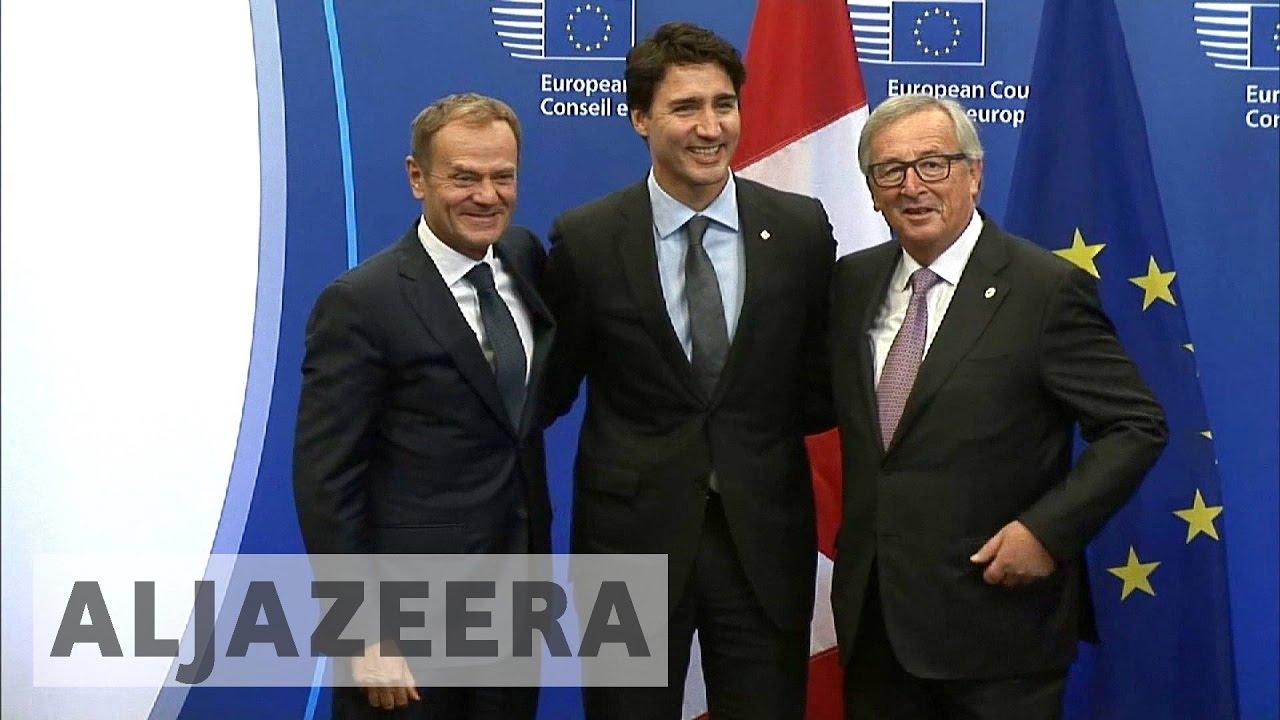 Moment image for Canada signs trade agreement CETA with European Union for economic cooperation and partnership.