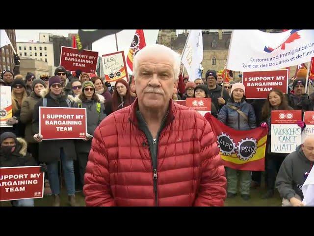 Moment image for Largest public service strike in Canadian history involving over 155,000 federal workers