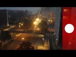 Riots in Husby spark debates on societal disparities and equity.