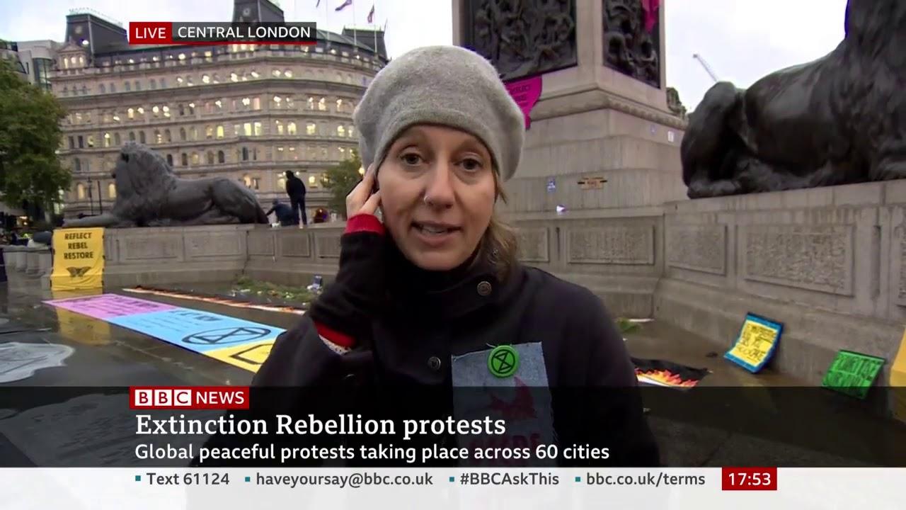 Moment image for Extinction Rebellion protests demand urgent climate action in London and other cities.