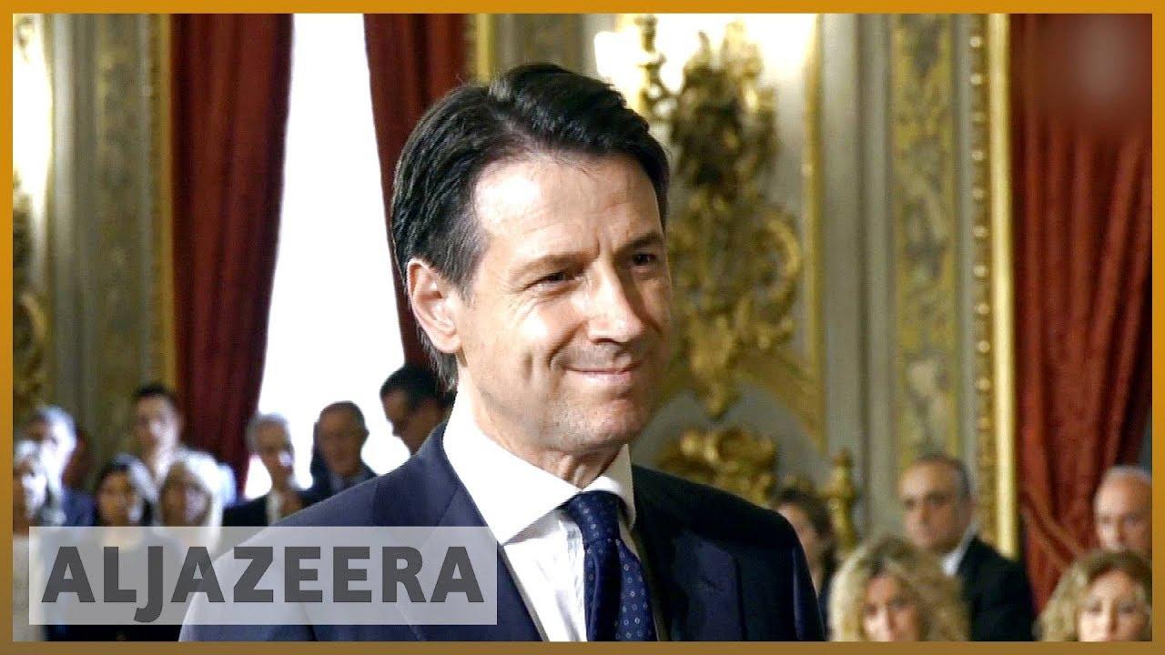 Moment image for Giuseppe Conte signs up as a prime minister 