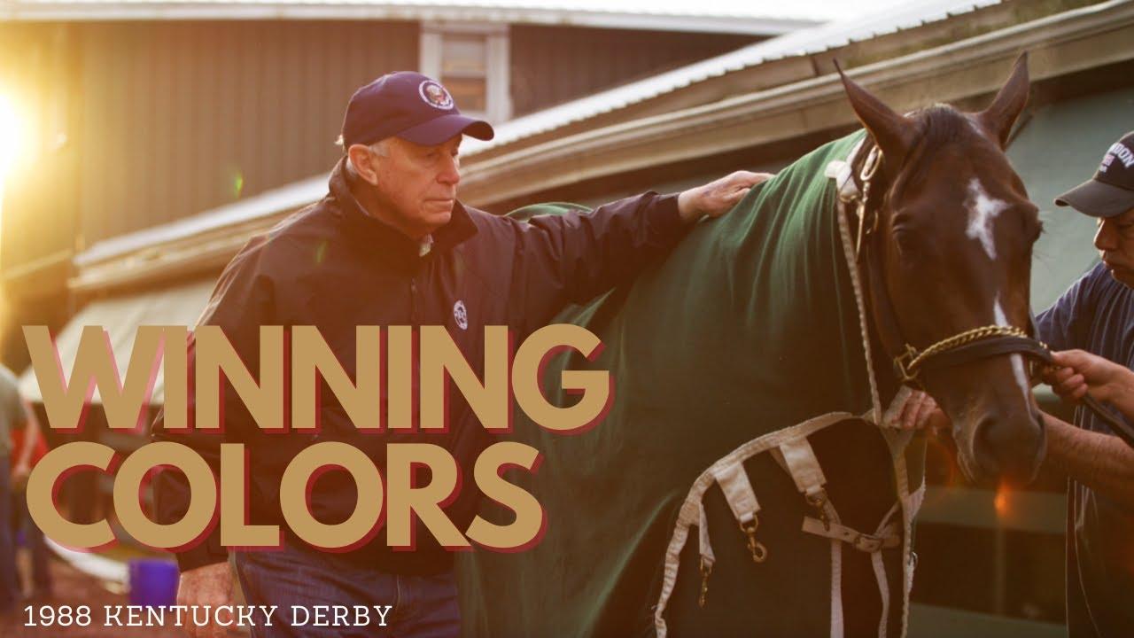 Moment image for Winning Colors triumphs under Gary Stevens in 1+1/4-mile race at fast track, 2:02.2.