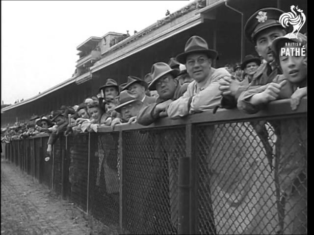 Moment image for Pensive triumphs in the race at 1+1⁄4 miles on a good track in 2:04.2.