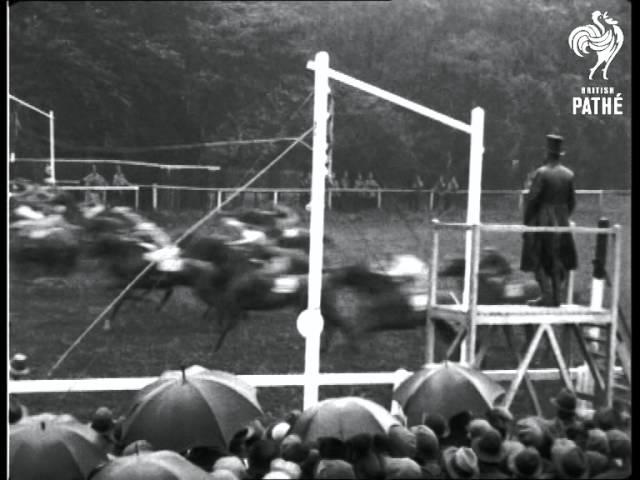 Moment image for Winner Bubbling Over clinches victory under jockey Albert Johnson at Kentucky Derby.
