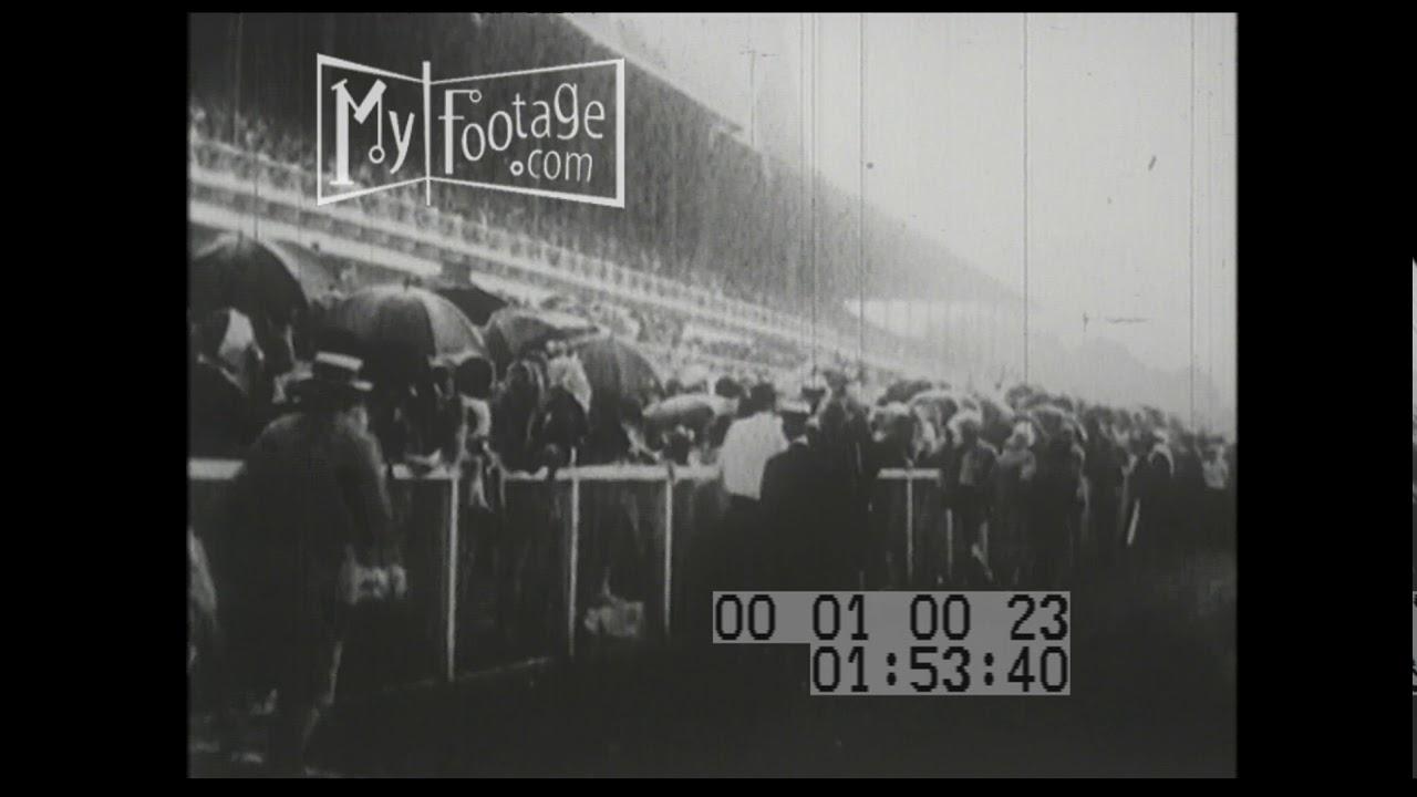 Moment image for Flying Ebony triumphed with Earl Sande riding for William Duke, owned by Gifford Cochran on a sloppy track.